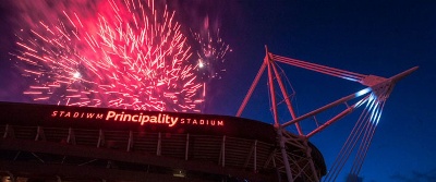 Fireworks outside a stadium at night